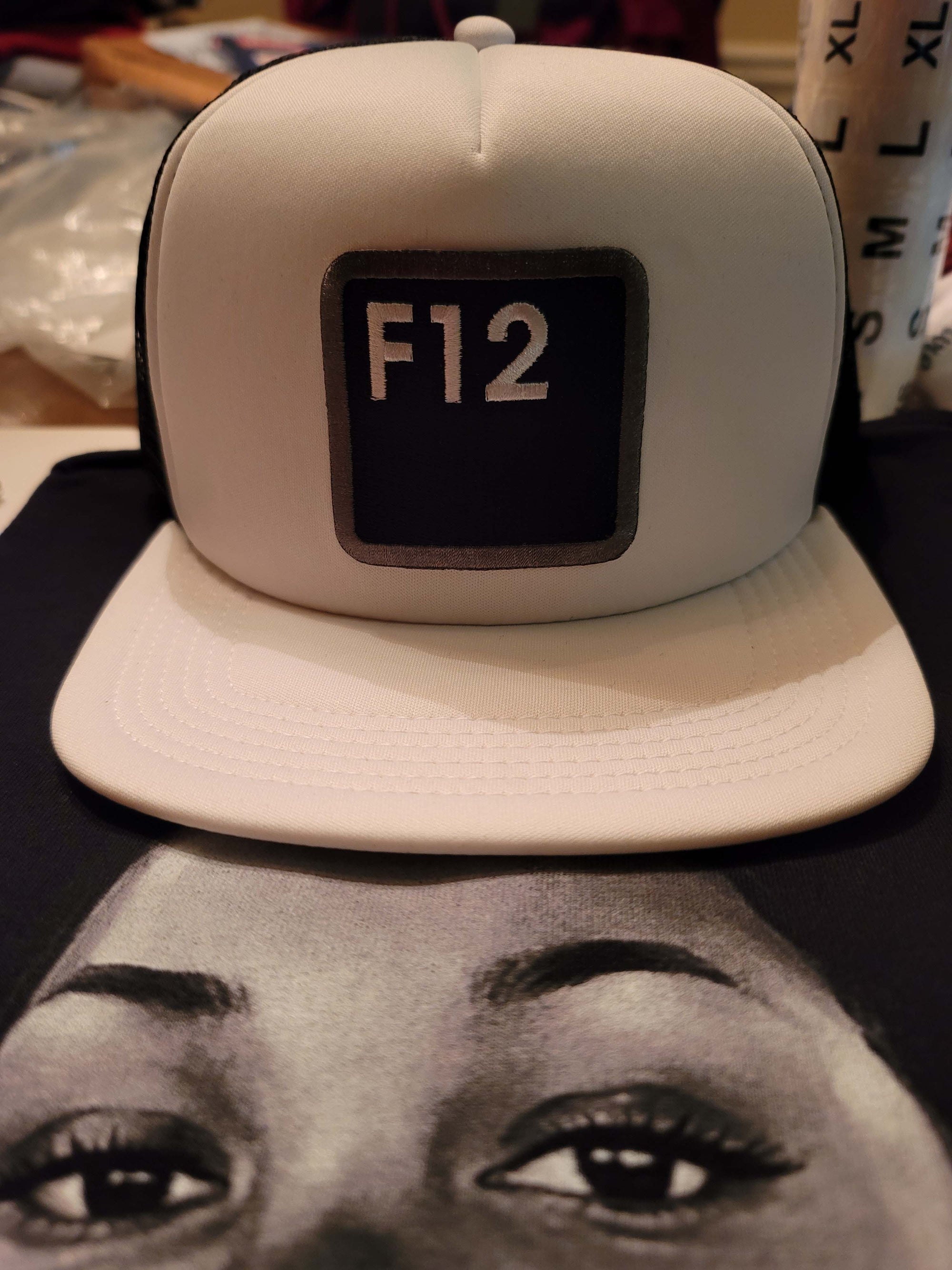 F12 PATCHWORK TRUCKER HAT